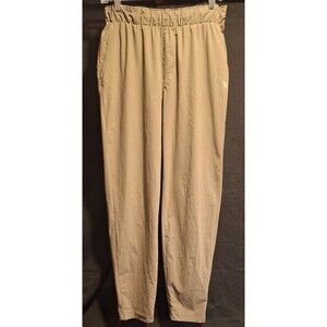 Vuori Joggers Mens Small Fleet Pants Tapered Leg Stretch Logo Tan Casual